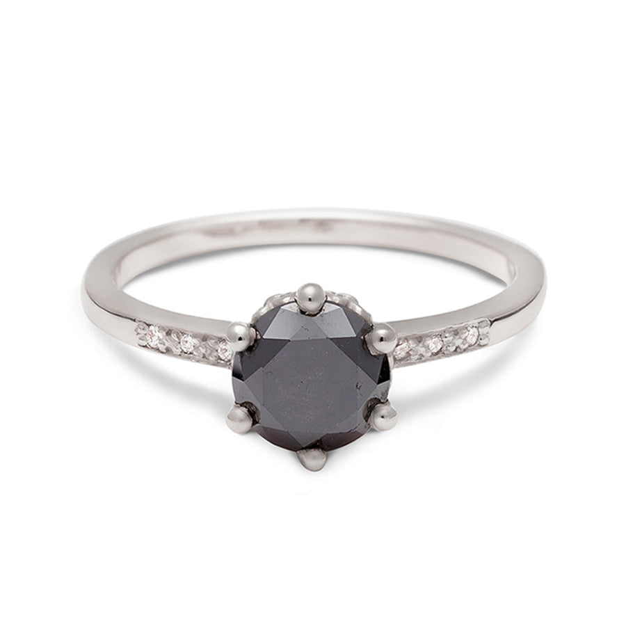 A solitaire ring with a round 1.00ct black diamond with white diamond pave on either side set in white gold., White Gold