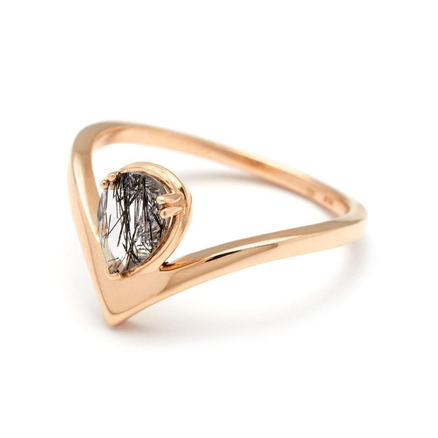Angled view of a pear shaped ring with a black rutilated quartz center stone set in yellow gold., Yellow Gold