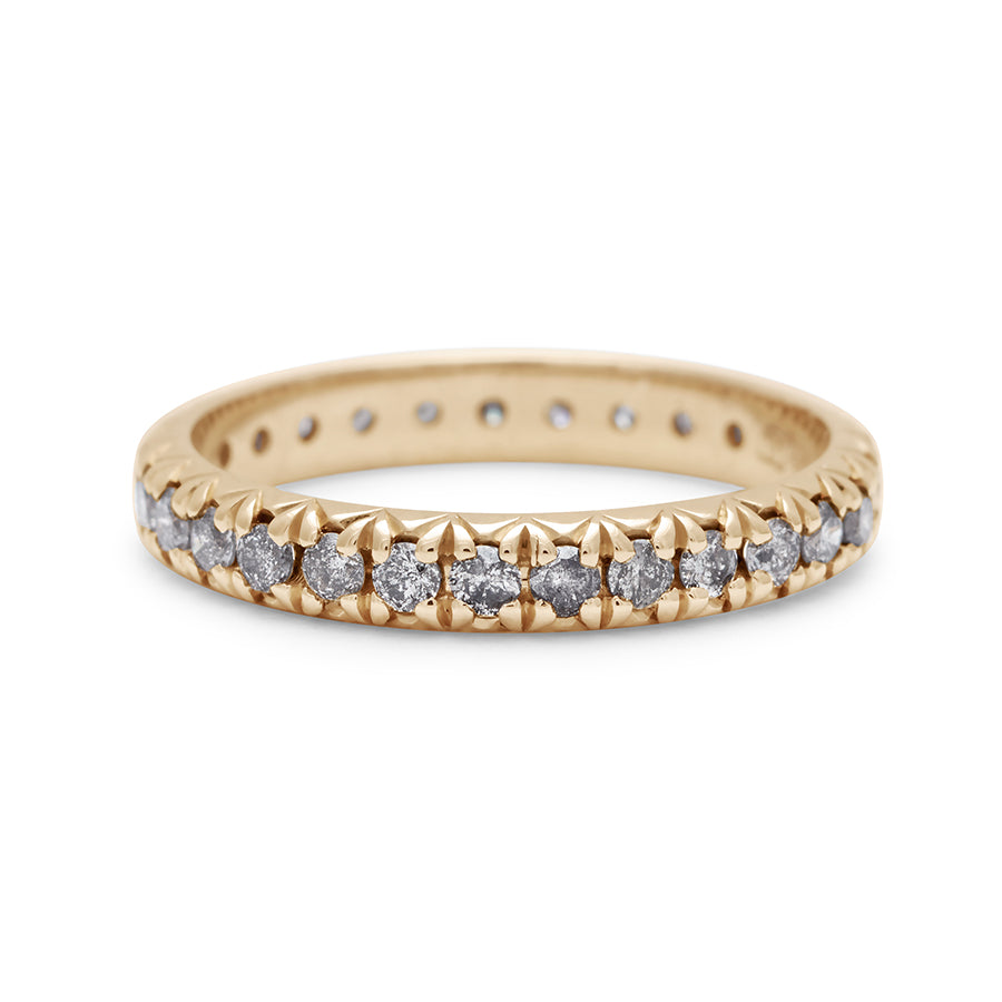 A yellow gold band with an eternity of round grey diamond stones., Yellow Gold