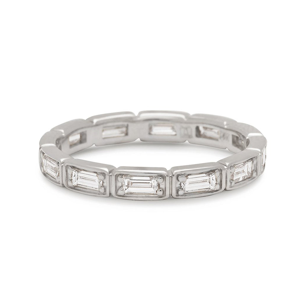 A white diamond baguette band that has diamond goes all around the band set in white gold., White Gold