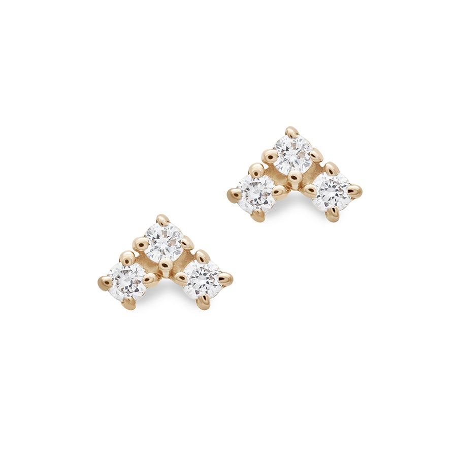 A pair of earrings with three white diamonds set in the shape of an arrow set in yellow gold., Yellow Gold