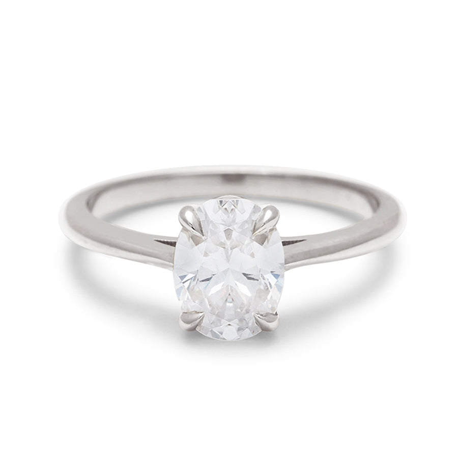 A solitaire brilliant cut oval 1.00ct white diamond set in white gold., White Gold