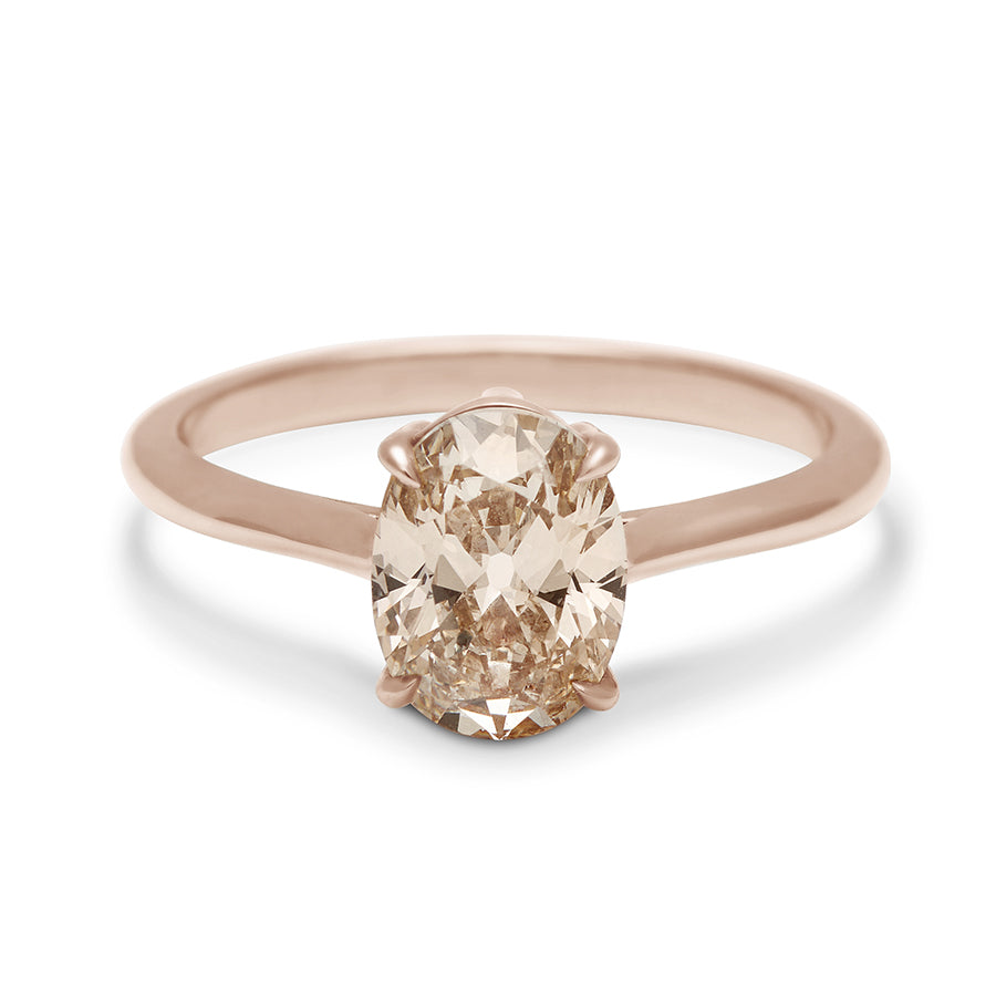 A solitaire oval champagne diamond set in rose gold., Rose Gold