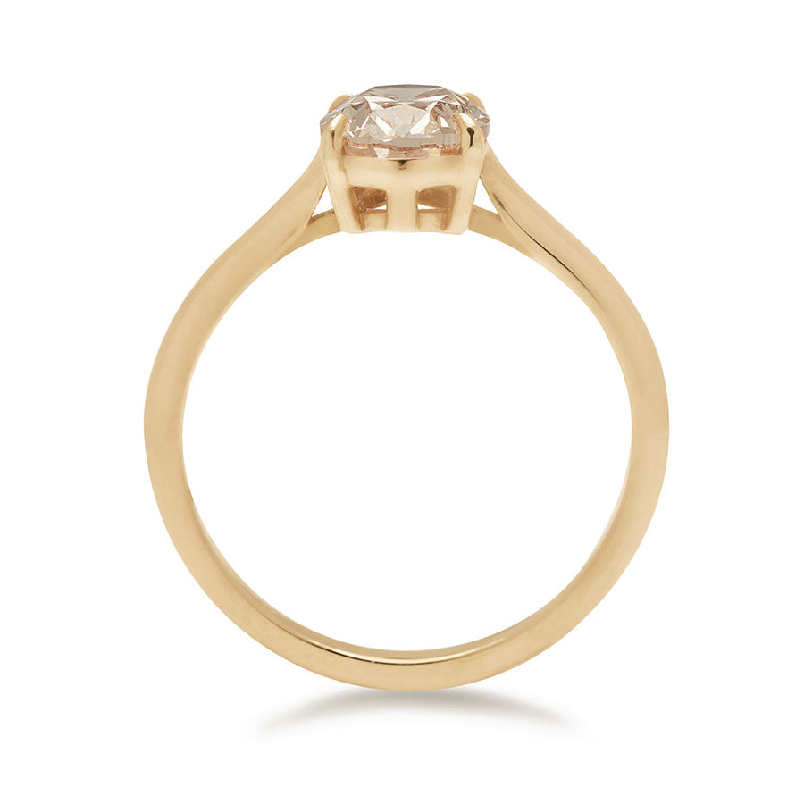 Side view of a solitaire oval champagne diamond set in yellow gold., Yellow Gold