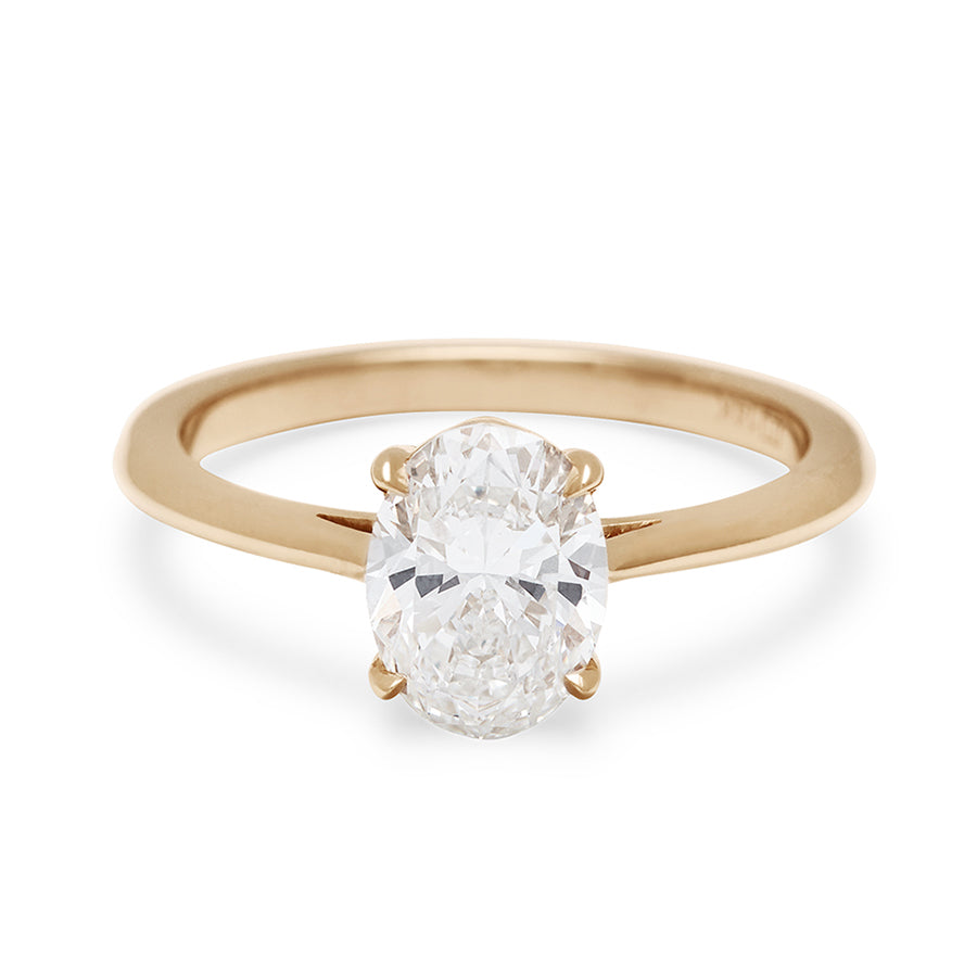 A solitaire oval brilliant cut 1.25ct white diamond set in yellow gold., Yellow Gold