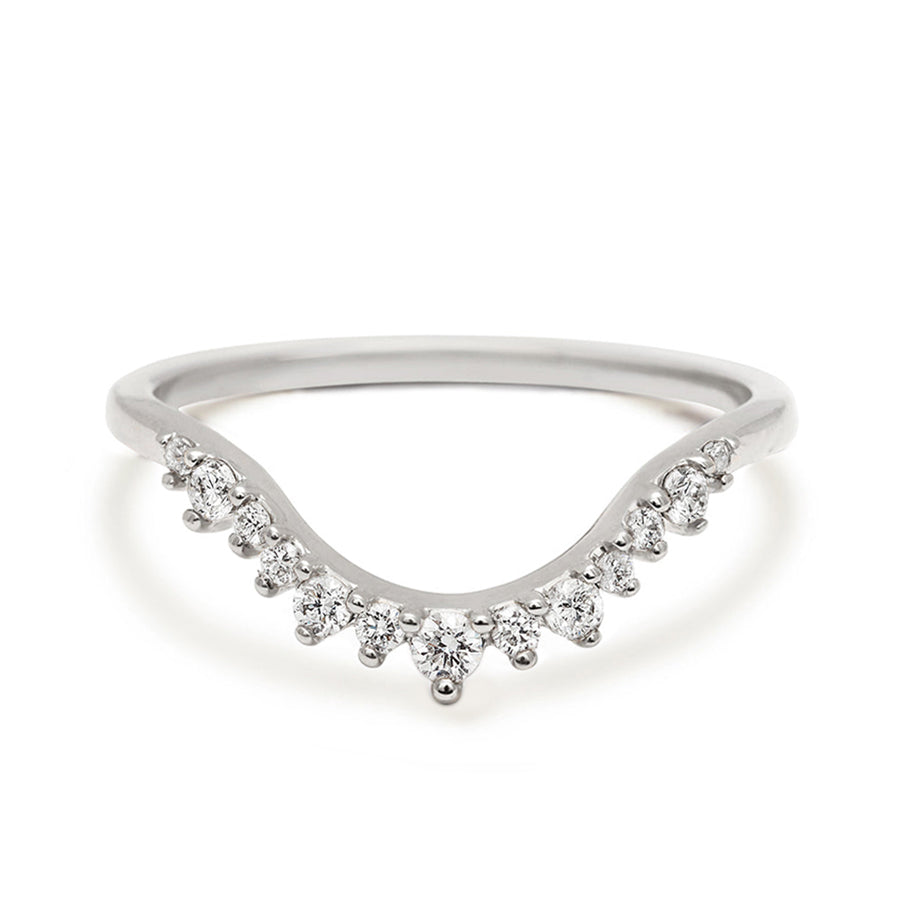 A curved white diamond band set in white gold., White Gold