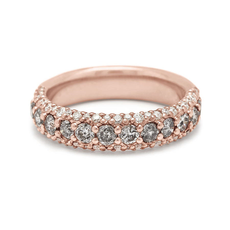 A band with round grey diamonds in a 3/4 pave around a rose gold band with white diamond accents on both top and bottom., Rose Gold