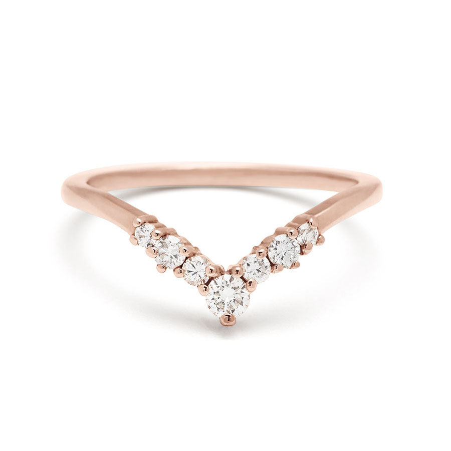 A band with white diamonds in ascending size set in rose gold., Rose Gold