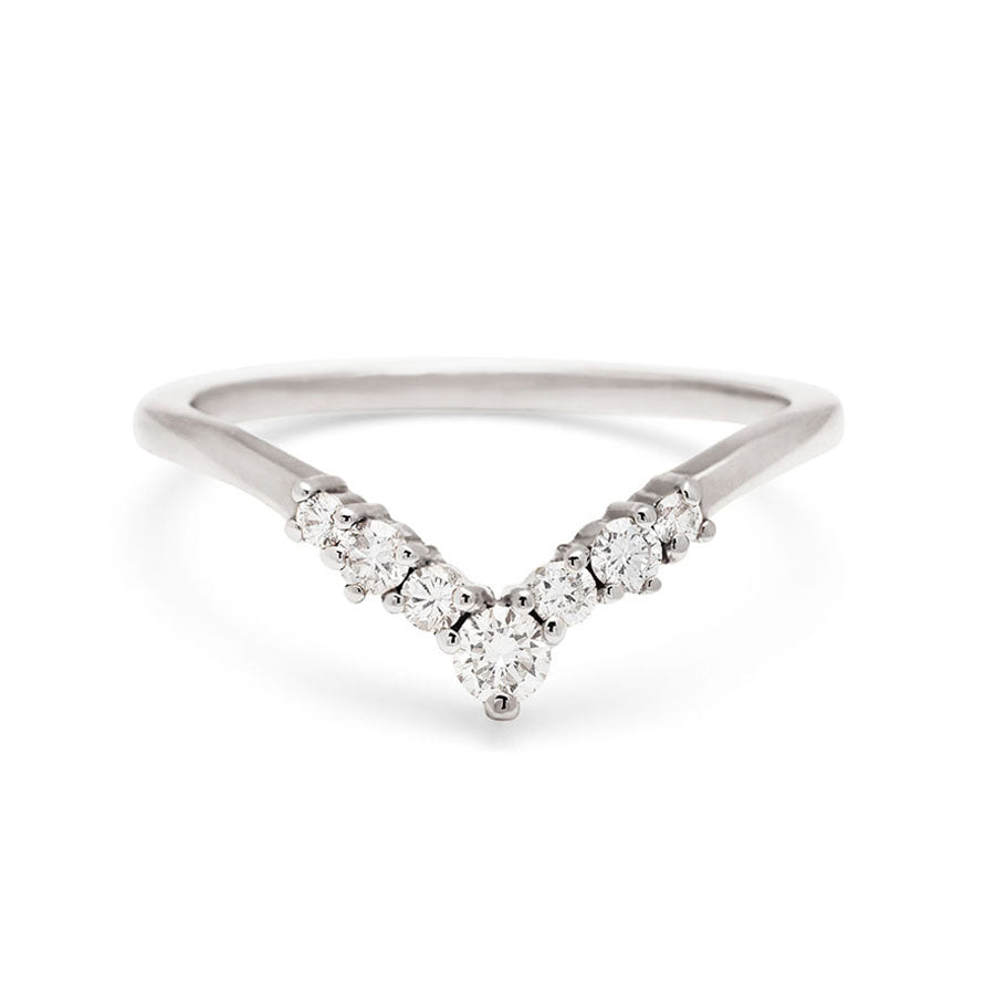 A band with white diamonds in ascending size set in white gold., White Gold