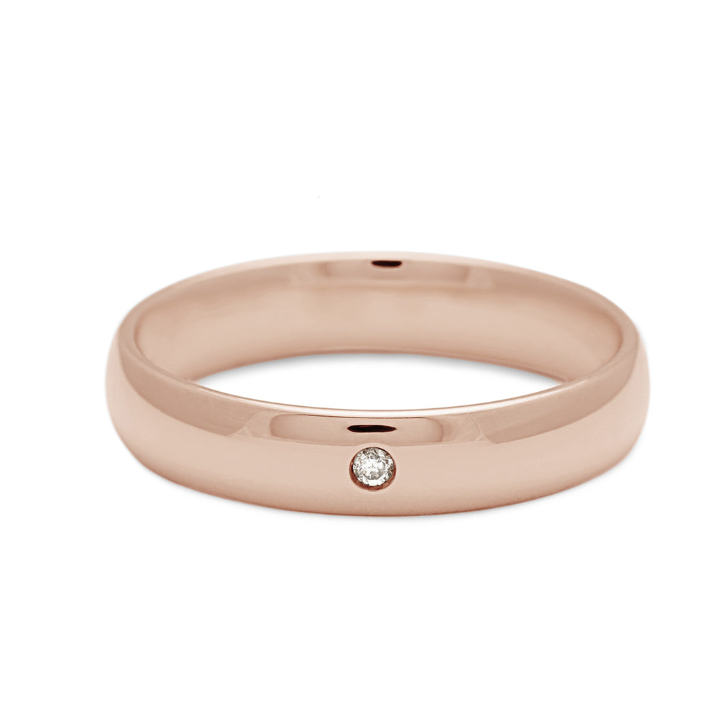 A 4mm classic round band with white diamond accent stone set in rose gold., Rose Gold