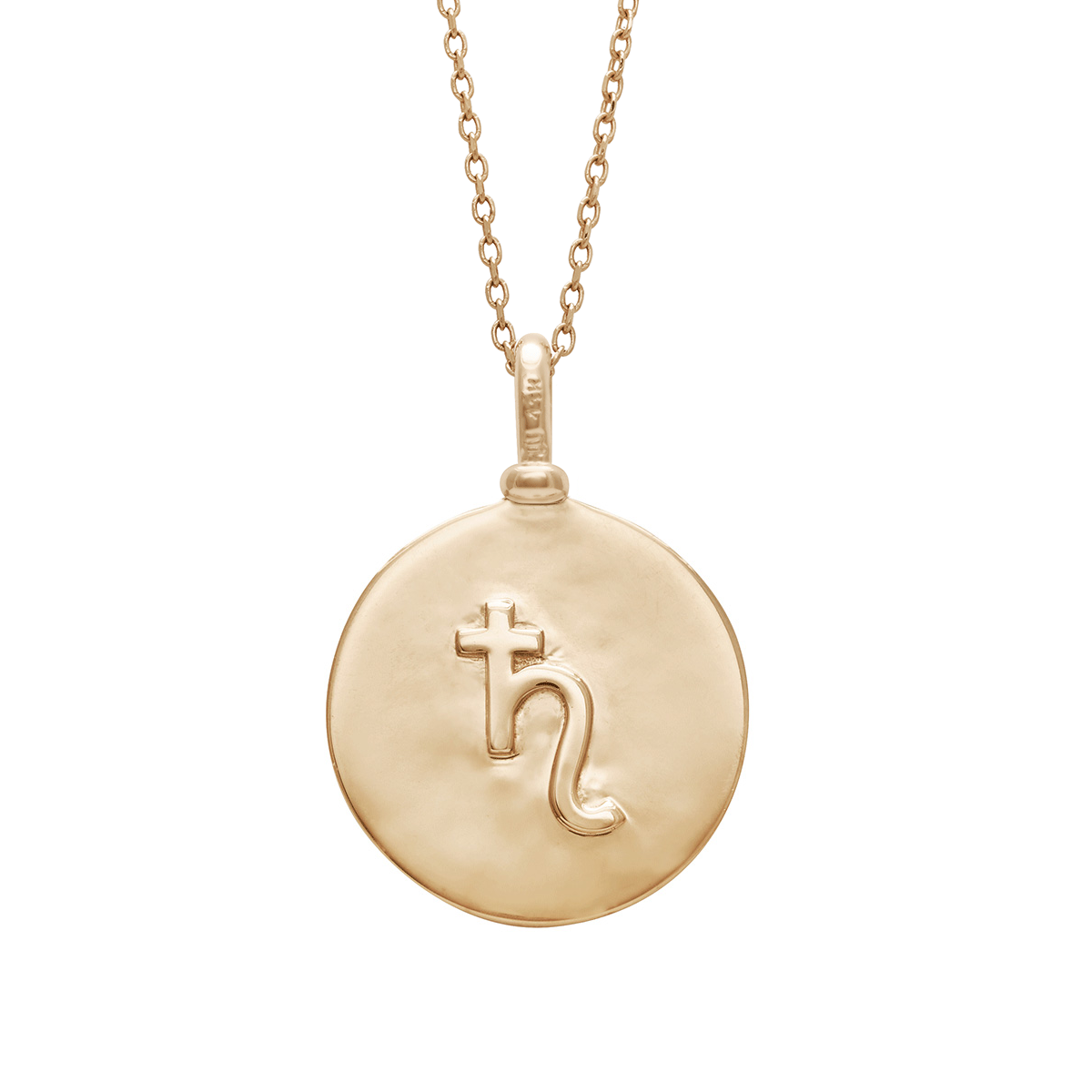 A 18mm charm with the saturn sign set in yellow gold on a yellow gold chain.