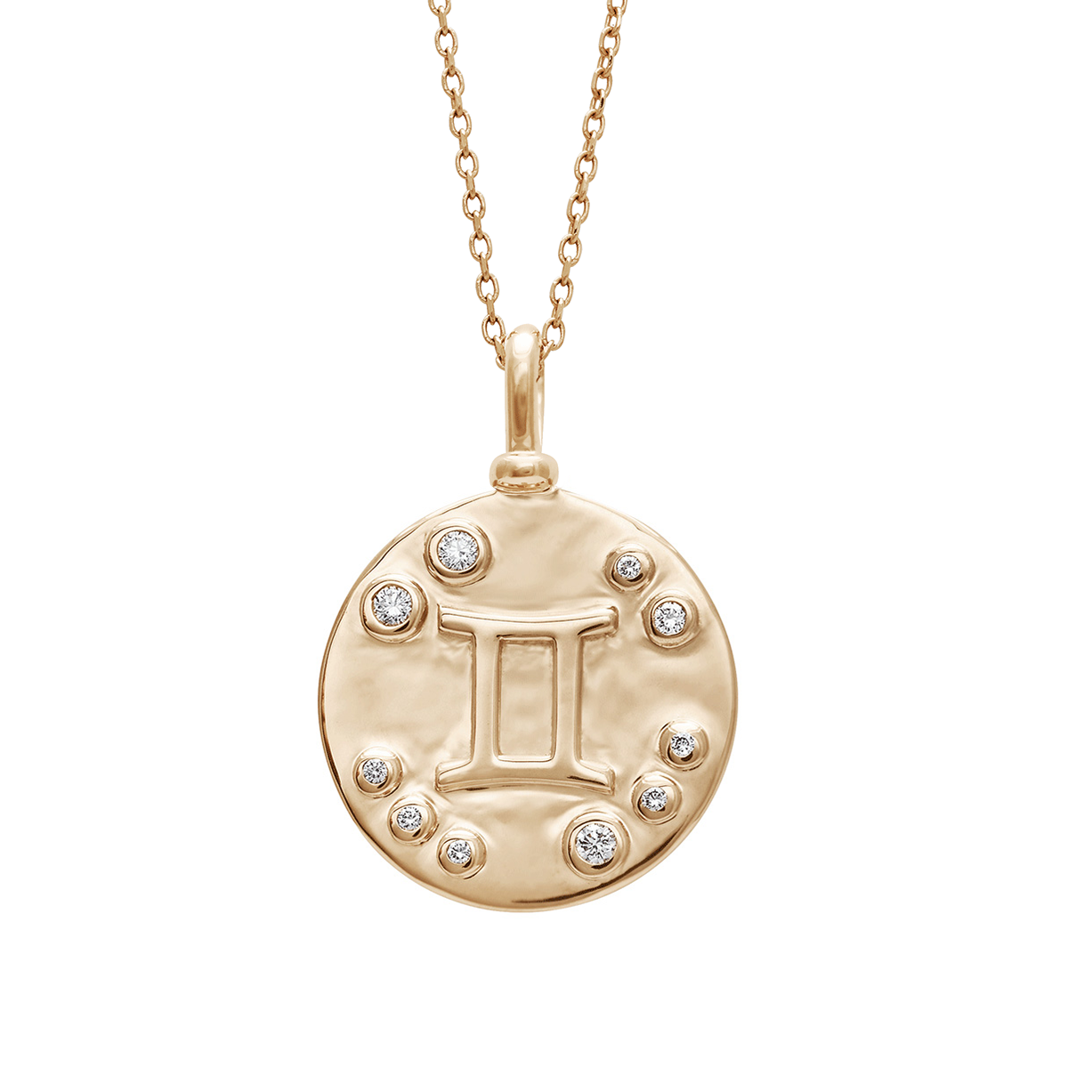 A 18mm charm with the Gemini zodiac sign set in yellow gold with white diamond stones on a yellow gold chain.