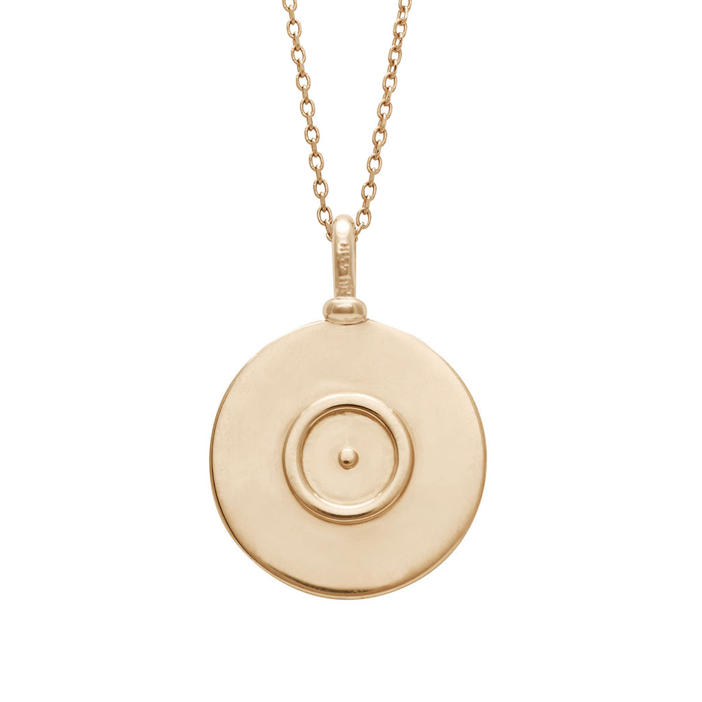 A 18mm charm with the Sun sign set in yellow gold on a yellow gold chain.