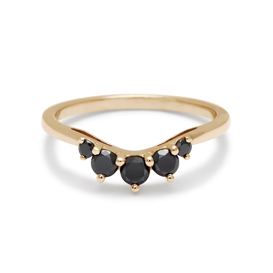 A curved 5 black diamond band set in yellow gold., Yellow Gold