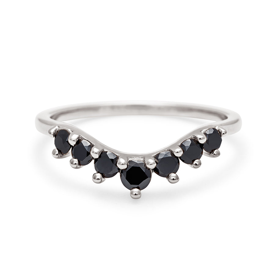 A curved 7 black diamond band set in white gold., White Gold
