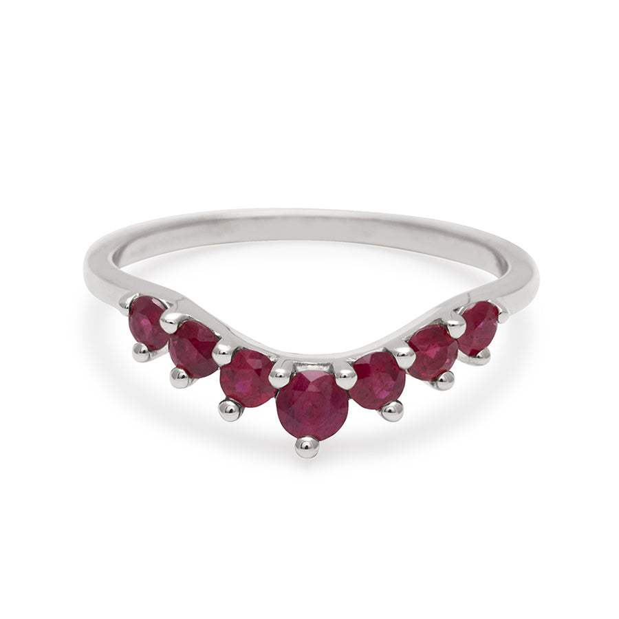 A curved 7 ruby band set in white gold., White Gold