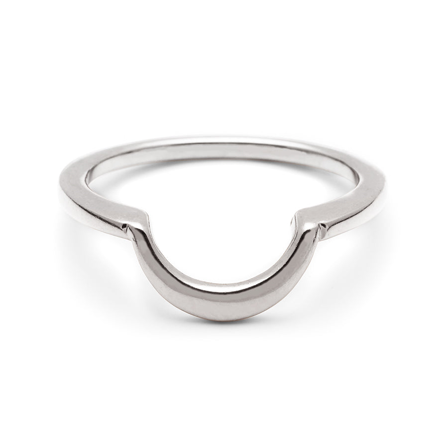 A crescent shaped band in solid gold set in white gold., White Gold