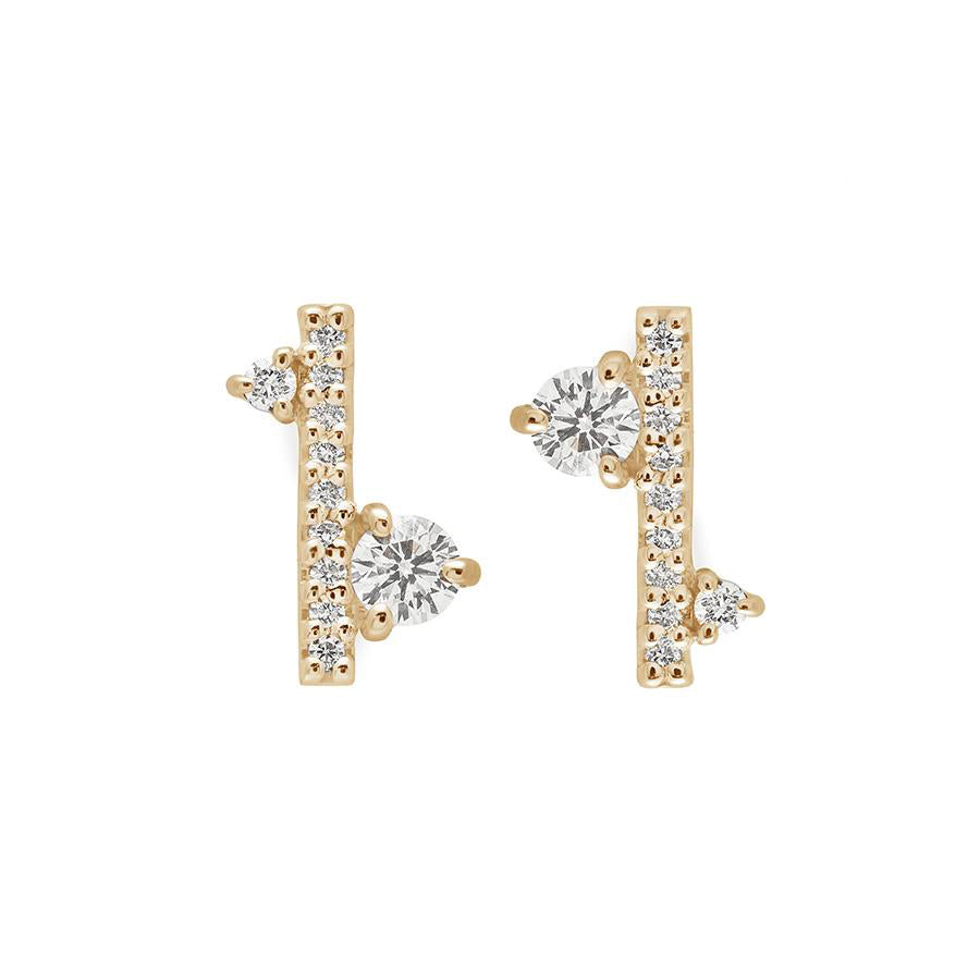 A pair of earrings with straight lines of white diamond pave with white diamond accent stones on either side set in a yellow gold., Yellow Gold