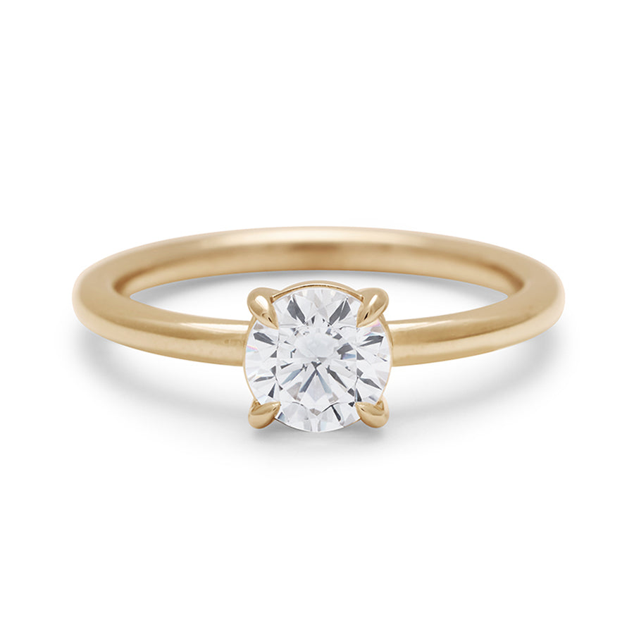 A solitaire round 0.75ct white diamond ring with claw prongs set in yellow gold., Yellow Gold