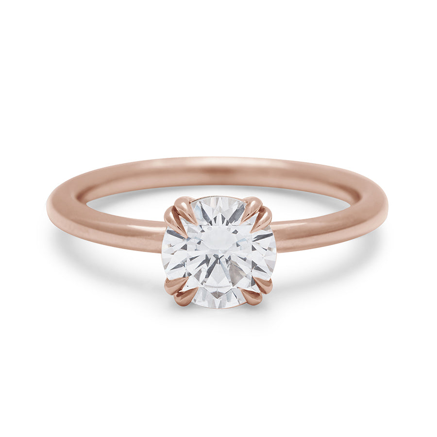 A solitaire round 1.00ct white diamond ring with double claw prongs set in rose gold., Rose Gold