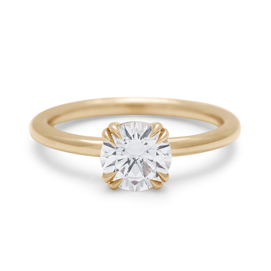 A solitaire round 1.00ct white diamond ring with double claw prongs set in yellow gold., Yellow Gold