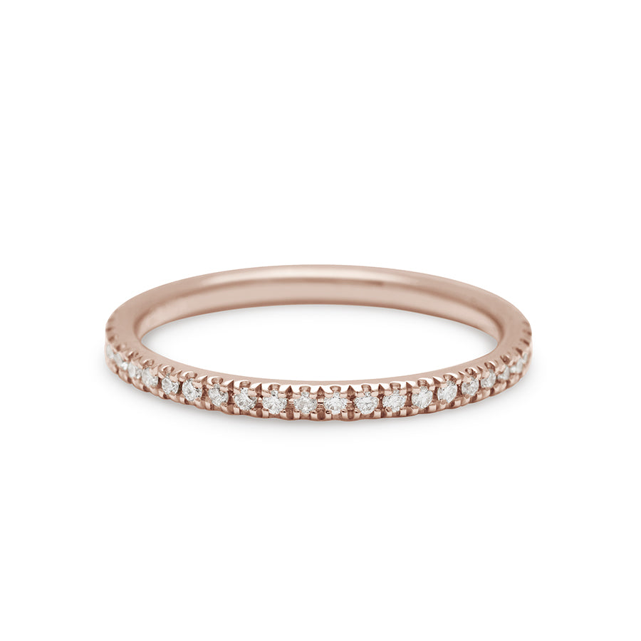 A straight band with white diamond pave 3/4 of the way around the band set in rose gold., Rose Gold