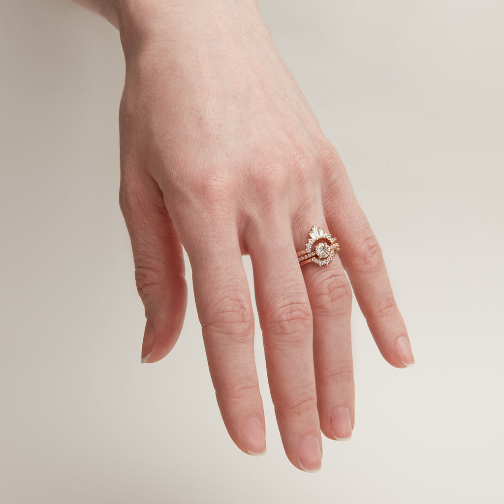 A three white diamond baguette band with three round white diamonds on either side set in yellow gold stacked above a solitaire champagne diamond ring and a tiny white diamond curve band., Yellow Gold, Rose Gold, White Gold