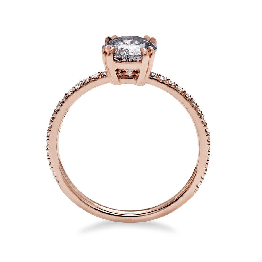 Side view of a solitaire round 1.00ct galaxy grey diamond ring with double claw prongs with white diamond pave on the band set in rose gold., Rose Gold