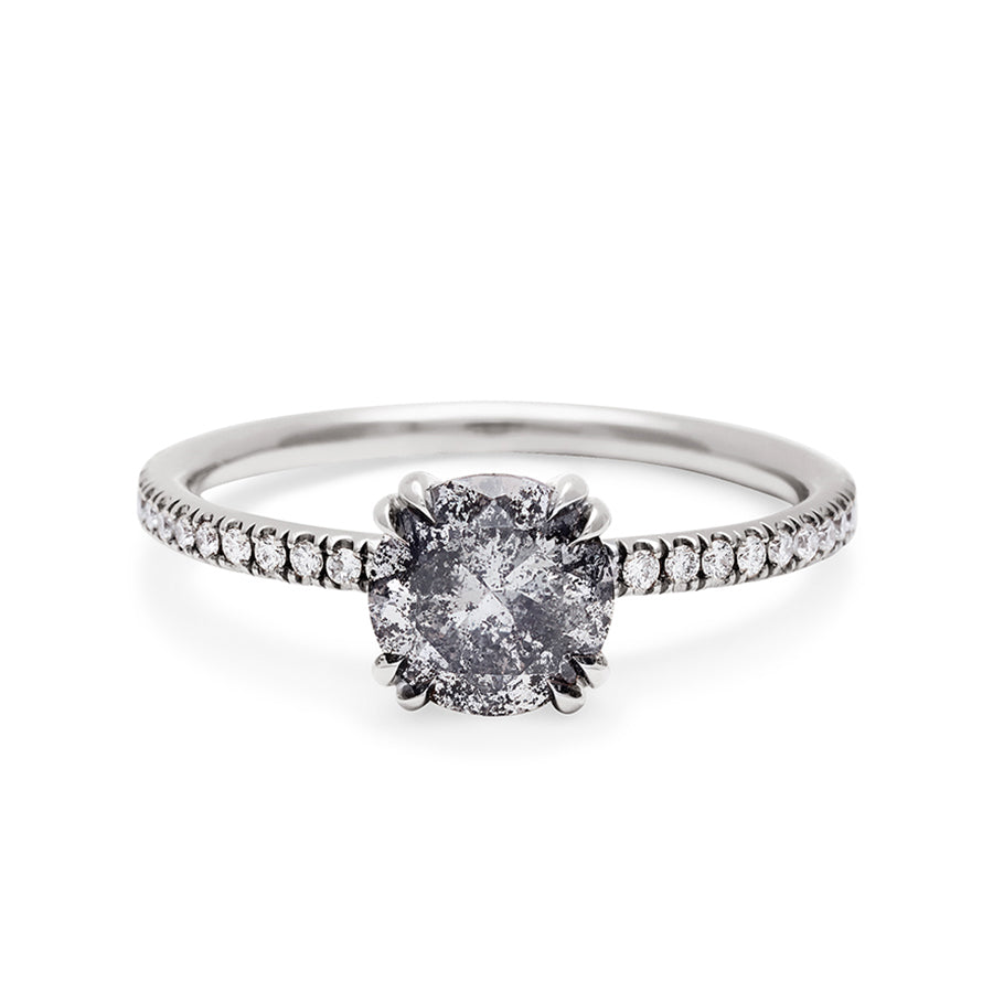 A solitaire round 1.00ct galaxy grey diamond ring with double claw prongs with white diamond pave on the band set in white gold., White Gold