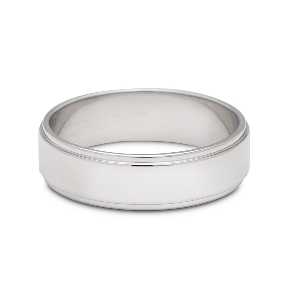 A 5mm flat edge band set in white gold., White Gold
