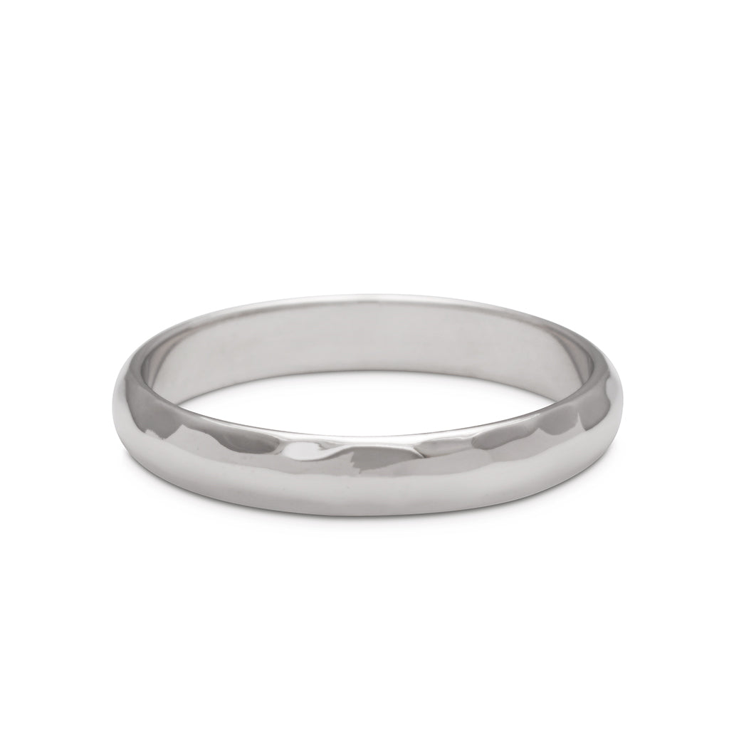 A 3mm classic round band with a hammered finish set in white gold.