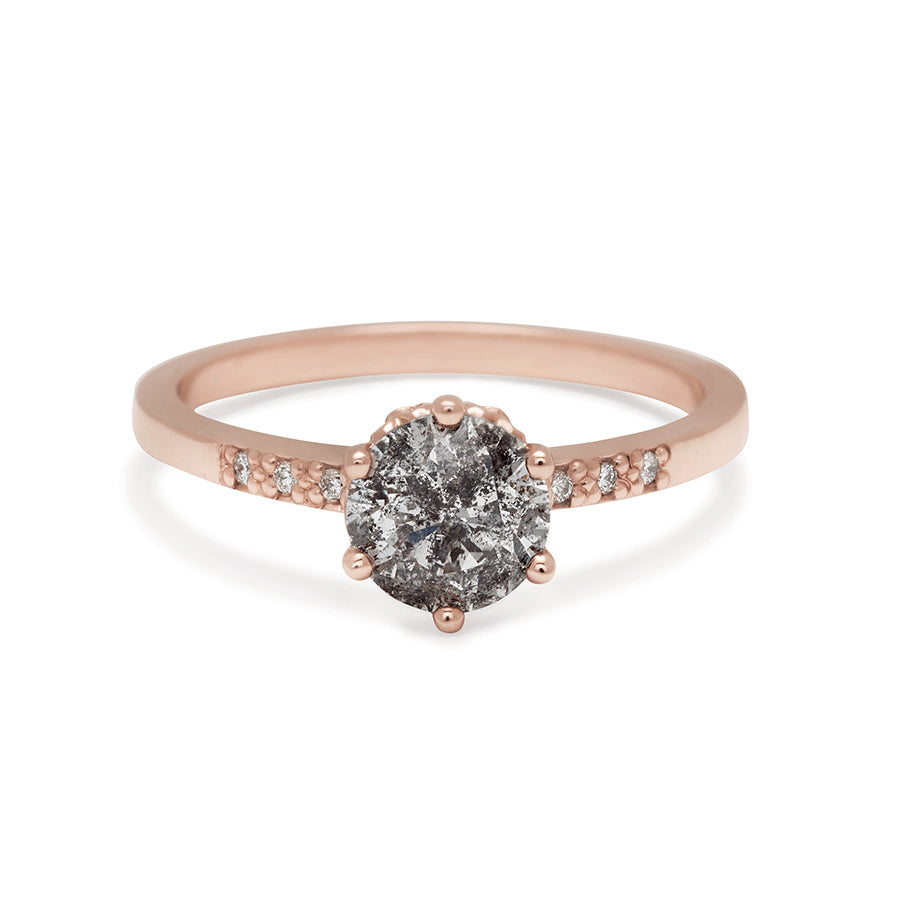 A solitaire ring with a 1.00ct round galaxy grey diamond with white diamond pave on either side set in rose gold., Rose Gold