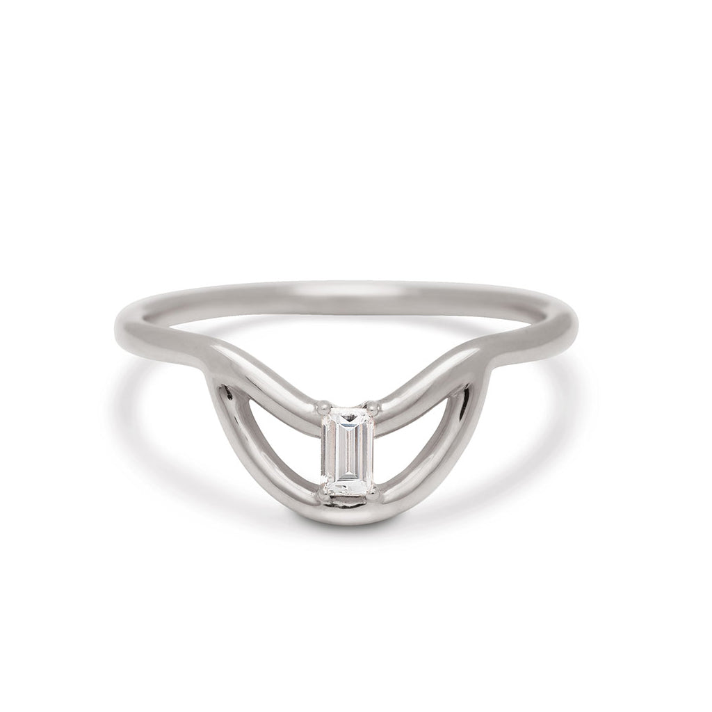 A helios band with a white diamond baguette set in white gold., White Gold