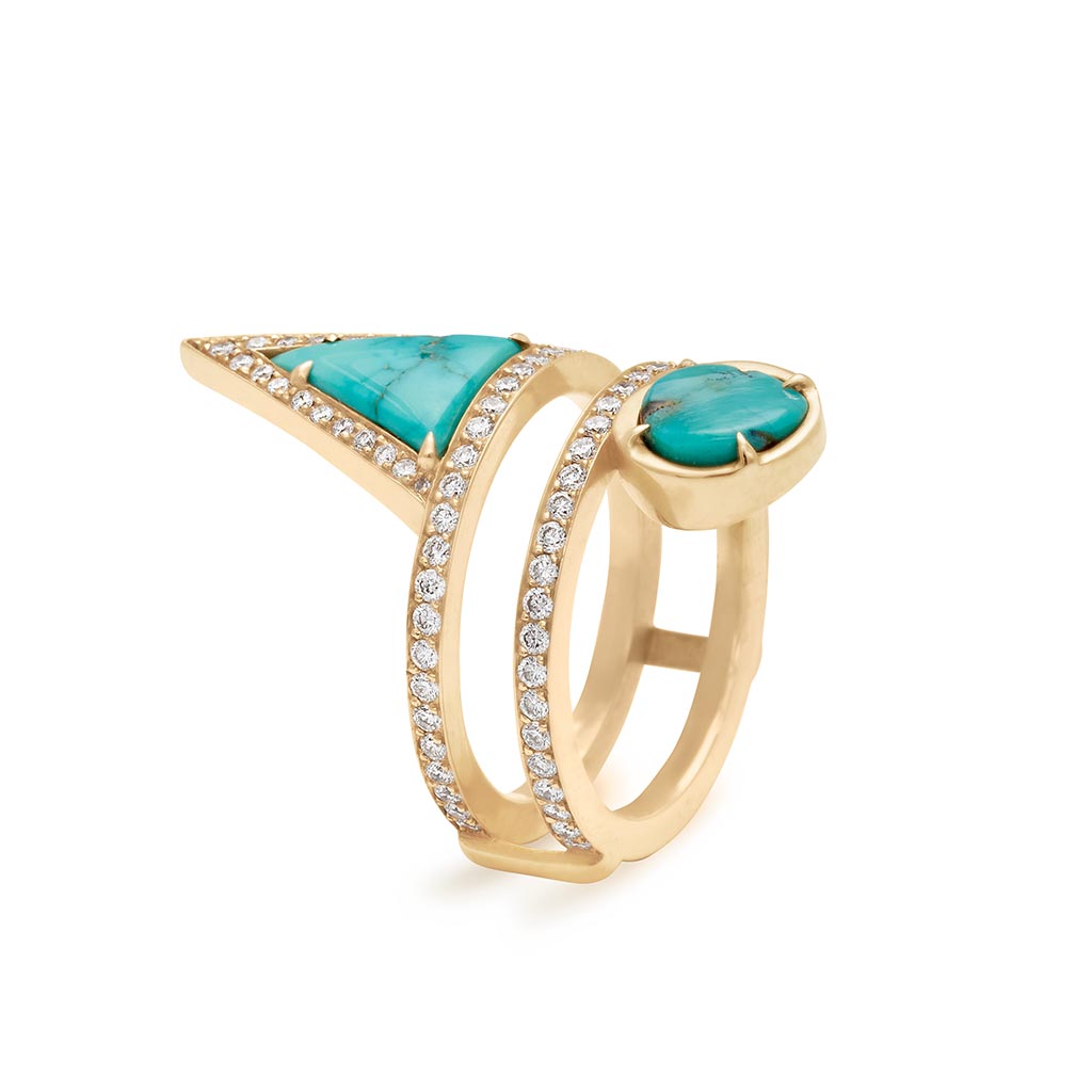 Side view of a double banded ring with white diamond pave around both bands with a triangle turquoise stone on the top and a round turquoise stone set in bezel with claw prongs in yellow gold.