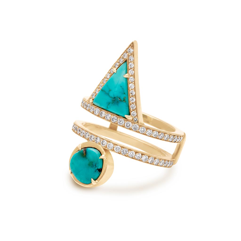 Angled view of a double banded ring with white diamond pave around both bands with a triangle turquoise stone on the top and a round turquoise stone set in bezel with claw prongs in yellow gold.