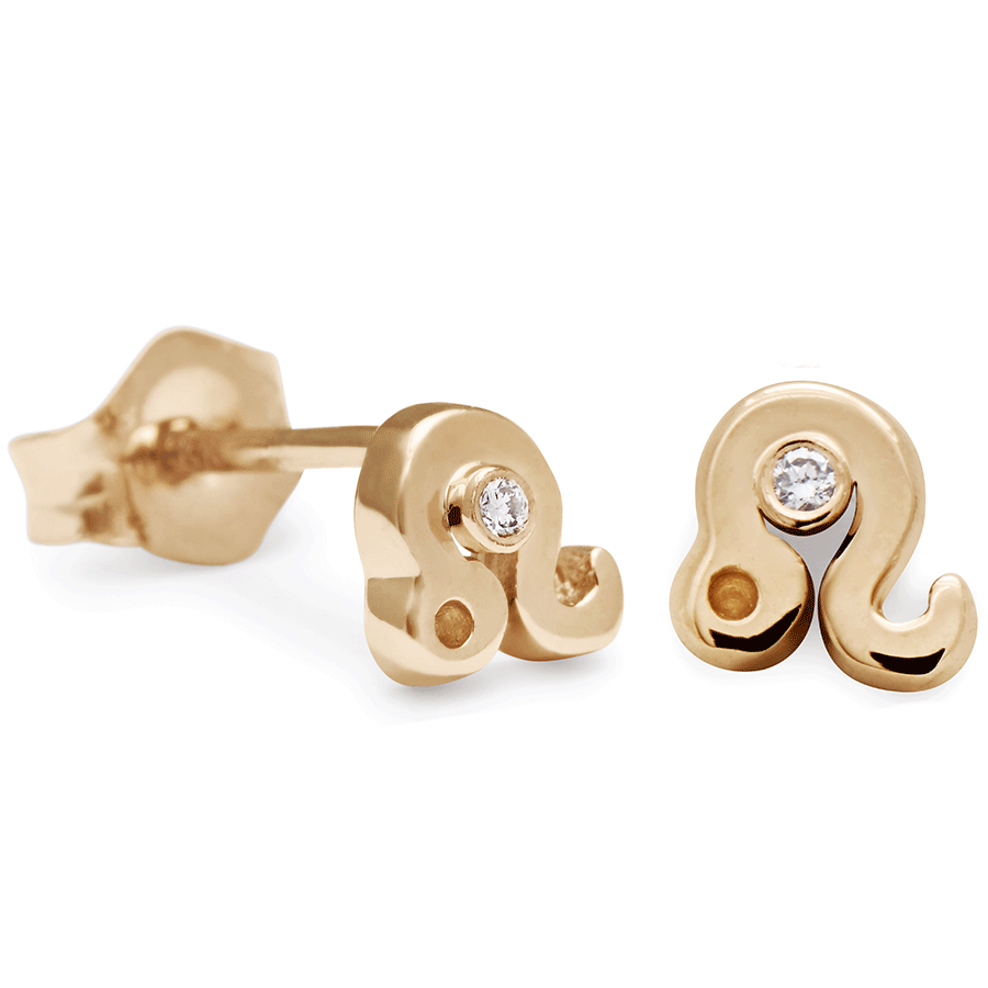 A pair of Leo stud earrings set in yellow gold with a white diamond accent stone with one earring angled.
