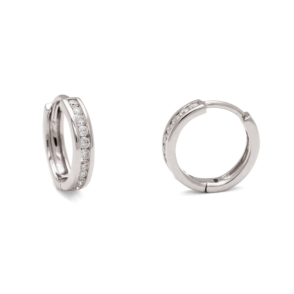A pair of hoops with a line of white diamonds set in white gold one earring turned to the side., White Gold