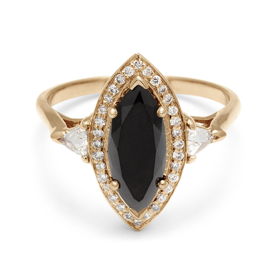 A three stone engagement ring with a marquise shape yellow diamond center stone surrounded by a lab white diamond with two lab white diamond trillion side stones set in yellow gold., Yellow Gold