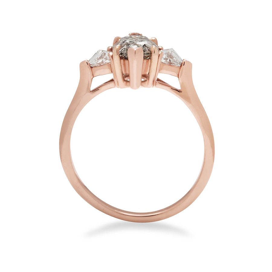 Side view of a three stone engagement ring with a marquise shape 1.50ct grey diamond center stone with two white diamond trillion side stones set in rose gold., Rose Gold