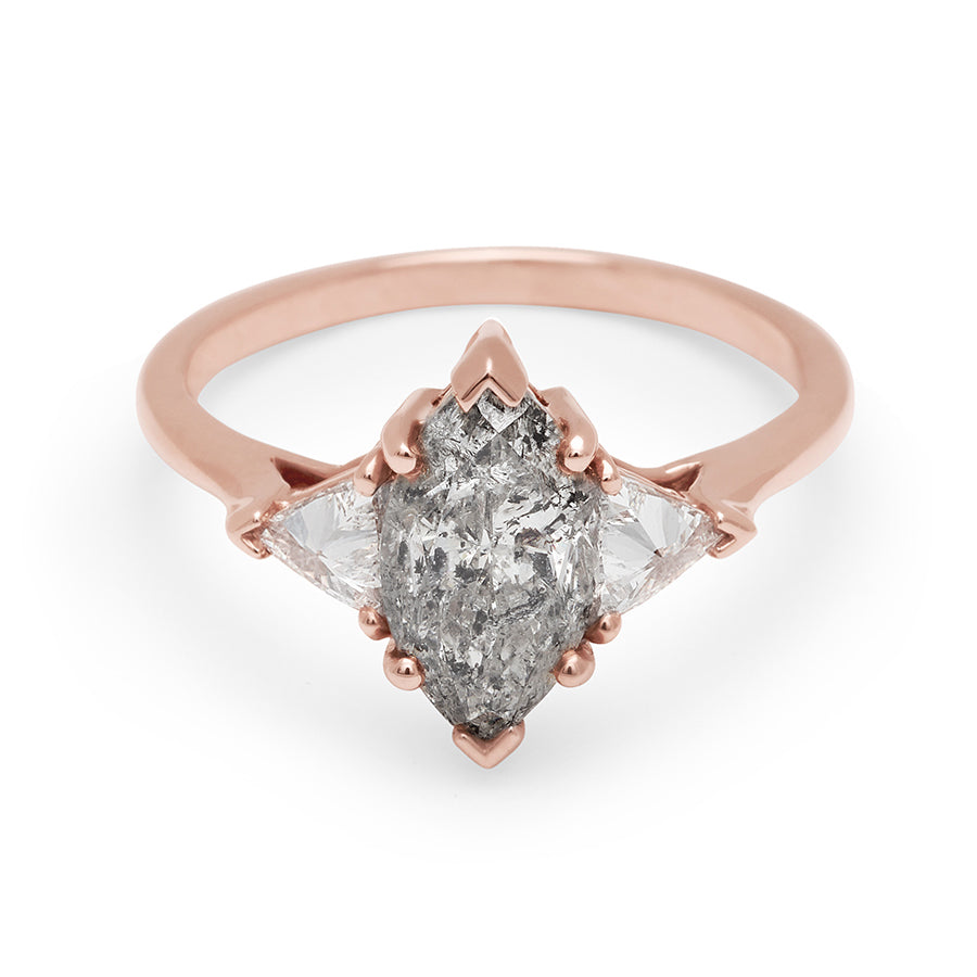 A three stone engagement ring with a marquise shape 1.50ct grey diamond center stone with two white diamond trillion side stones set in rose gold., Rose Gold