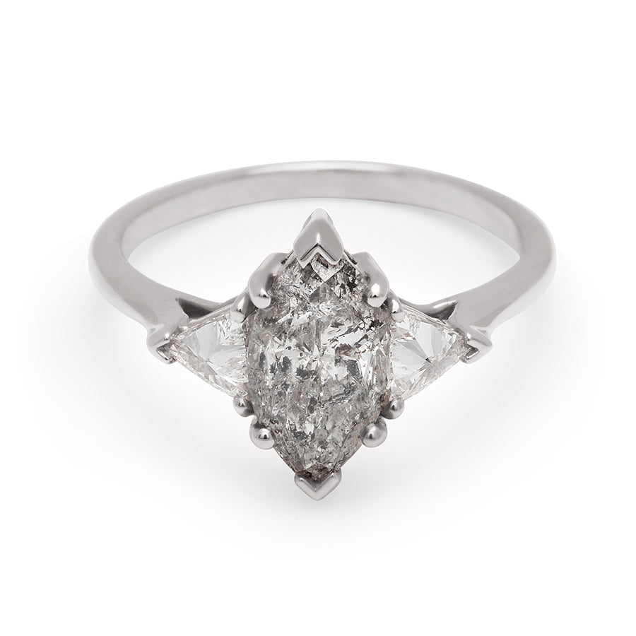 A three stone engagement ring with a marquise shape 1.50ct grey diamond center stone with two white diamond trillion side stones set in white gold., White Gold