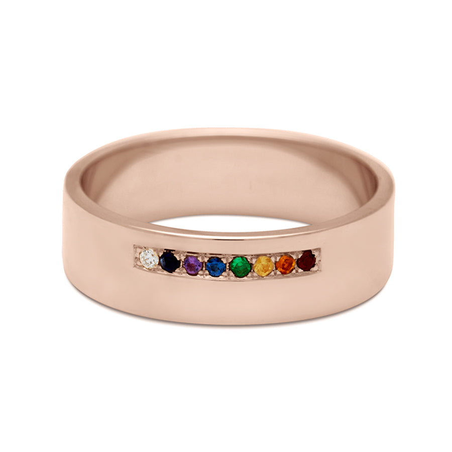 A 5mm flat band with a line of rainbow colored stones set in rose gold., Rose Gold