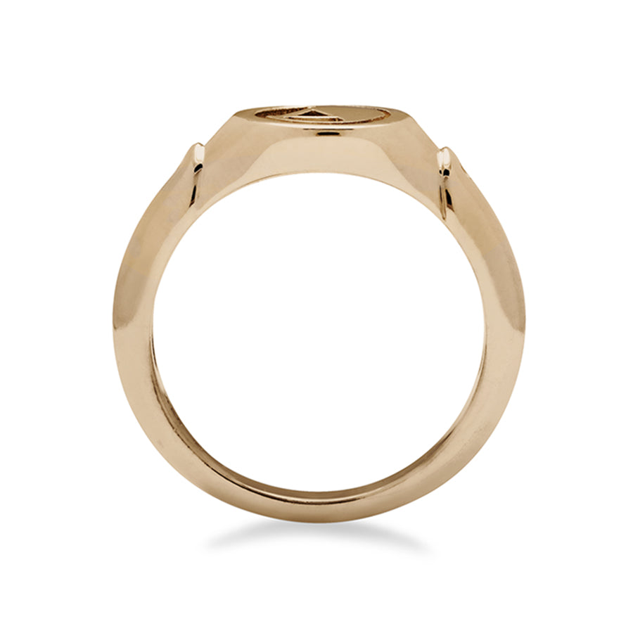 Side view of a monogrammed signet ring with an "A" on the front and two white diamond accents on either side and set in yellow gold.