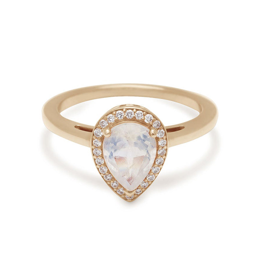 An engagement ring with a pear shape rainbow moonstone center stone surrounded by a white diamond pave halo set in yellow gold., Yellow Gold