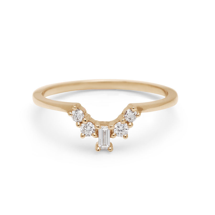 A white diamond baguette band with two round diamonds on either side set in yellow gold., Yellow Gold