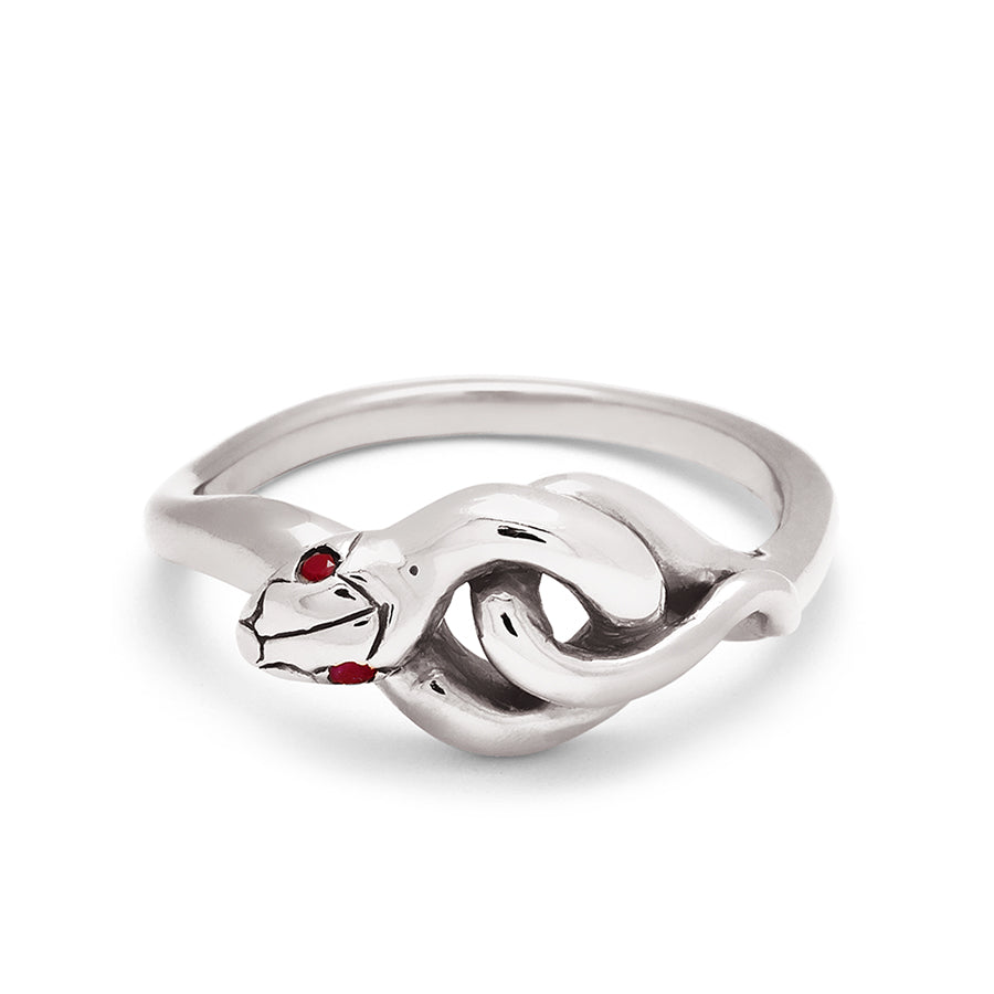 A serpent band with rubies for eyes set in white gold., White Gold