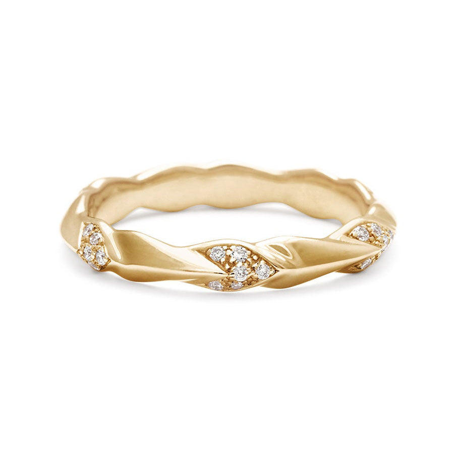 A straight band with leaf like definition with white diamond accents set in yellow gold., Yellow Gold