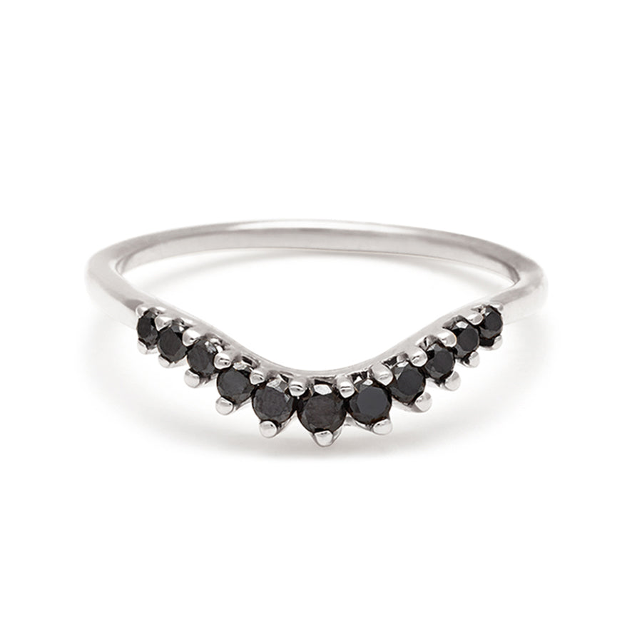 A curved 11 black diamond band set in white gold., White Gold
