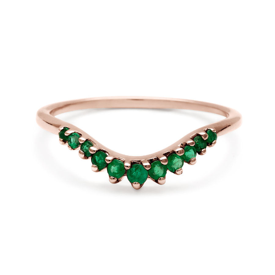 A curved 11 emerald band set in rose gold., Rose Gold