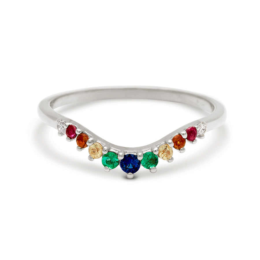 A curved 11 rainbow colored gemstones band set in white gold., White Gold